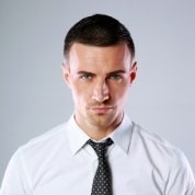 demo-attachment-768-portrait-of-a-confident-man-over-gray-background-PDL3Q9F